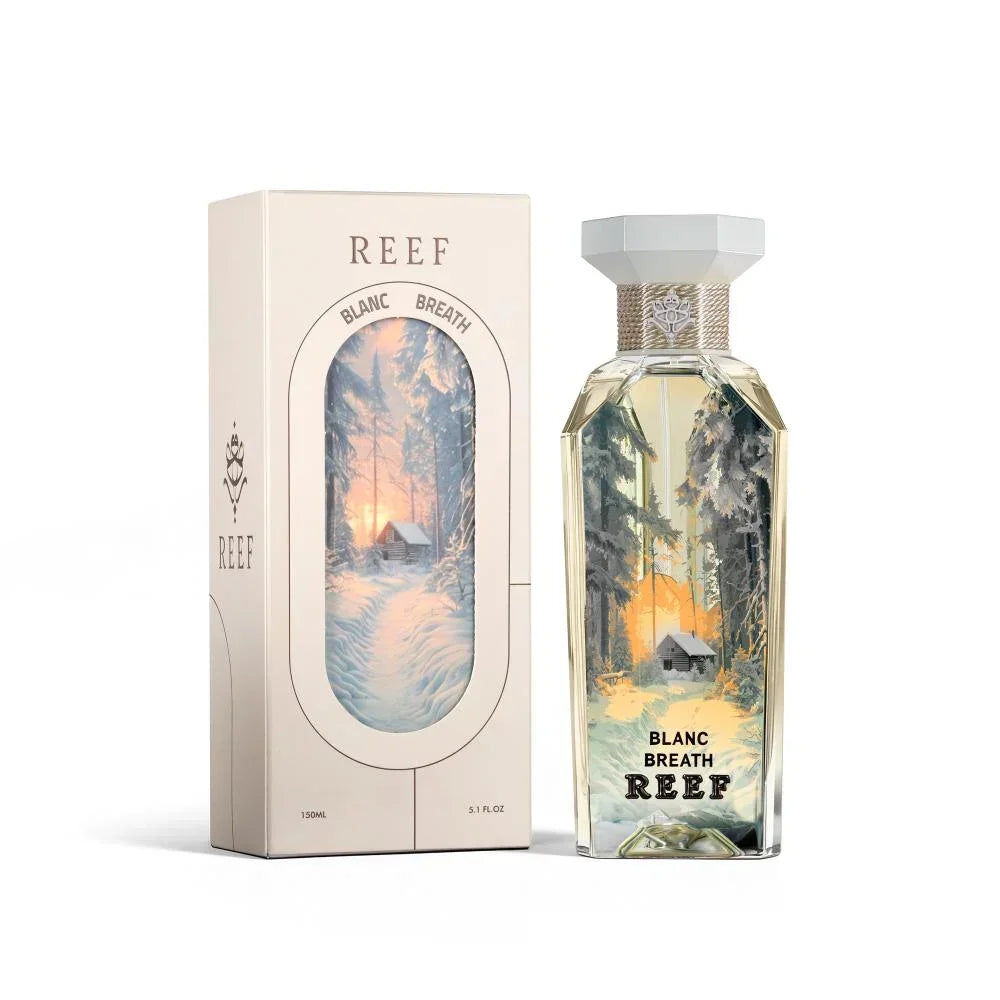 Blanc Breath REEF perfume bottle with snowy forest scene, evoking desert freshness and Arabian gardens