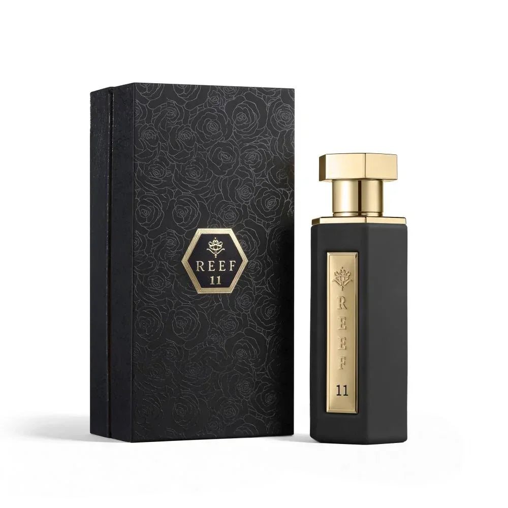 REEF 11 luxury perfume bottle with elegant black and gold packaging, featuring floral design