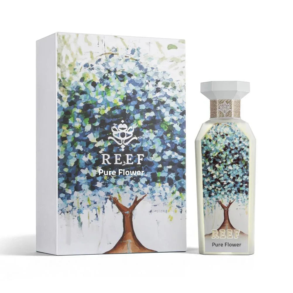 REEF Pure Flower perfume bottle and box with floral tree design, evoking Arabian garden notes