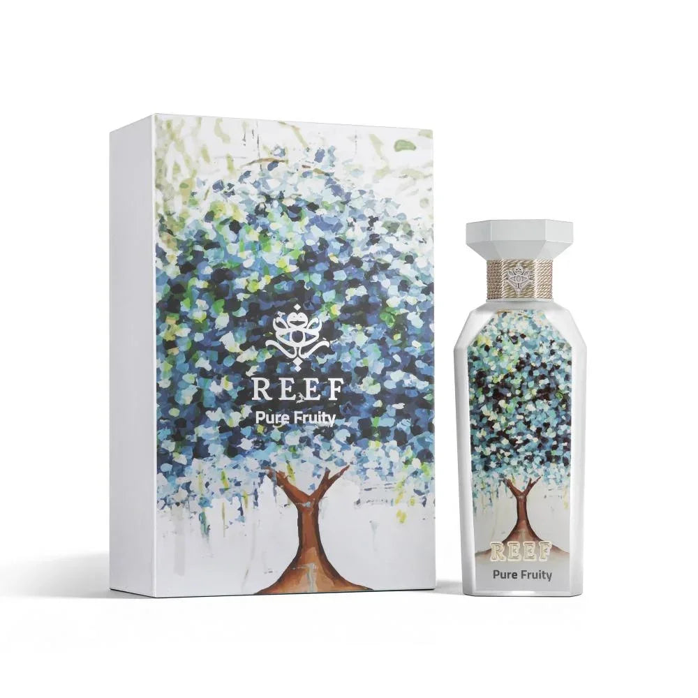 REEF Pure Fruity perfume bottle and box with artistic tree design, evoking fresh fruity notes