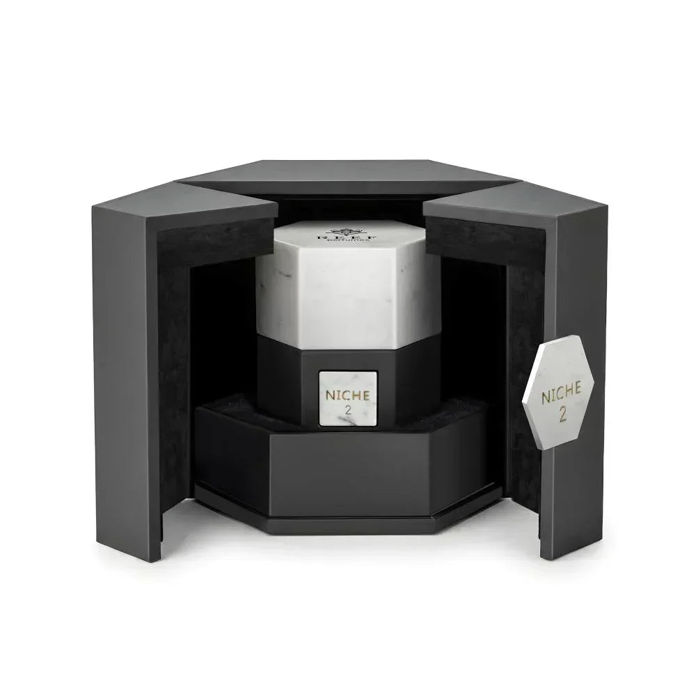 Niche 2 luxury perfume in hexagonal marble and black packaging, elegant unboxing design