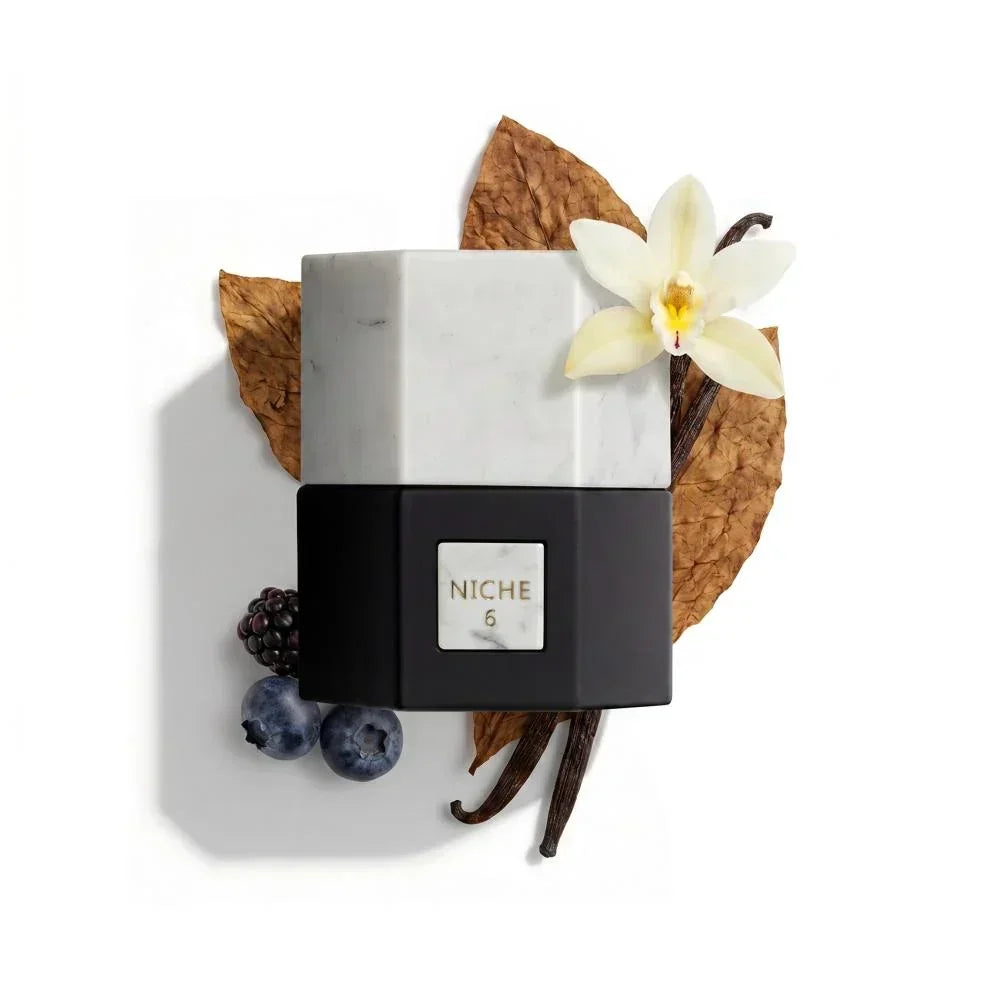 Niche 6 perfume bottle with vanilla orchid, berries, and dried leaves, evoking oriental fragrance notes