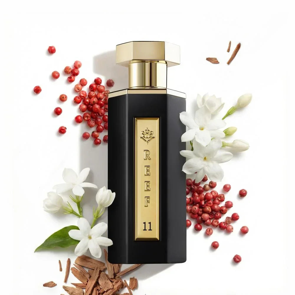 REEF 11 luxury perfume bottle with jasmine flowers, pink peppercorns, and spice accents
