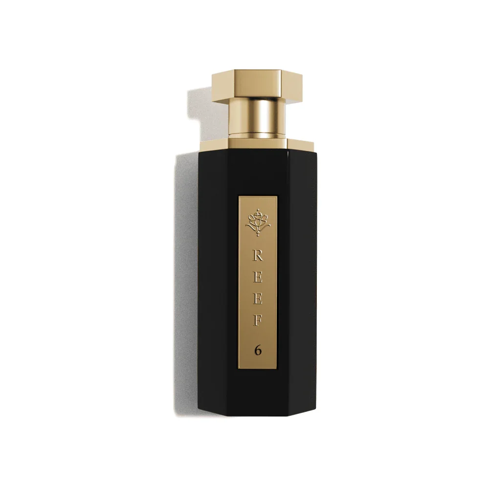 Luxury black perfume bottle with gold cap and REEF 6 label, elegant oriental fragrance design