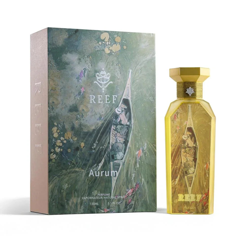 REEF Aurum perfume bottle and box with artistic boat design, evoking Oriental luxury and fragrance notes