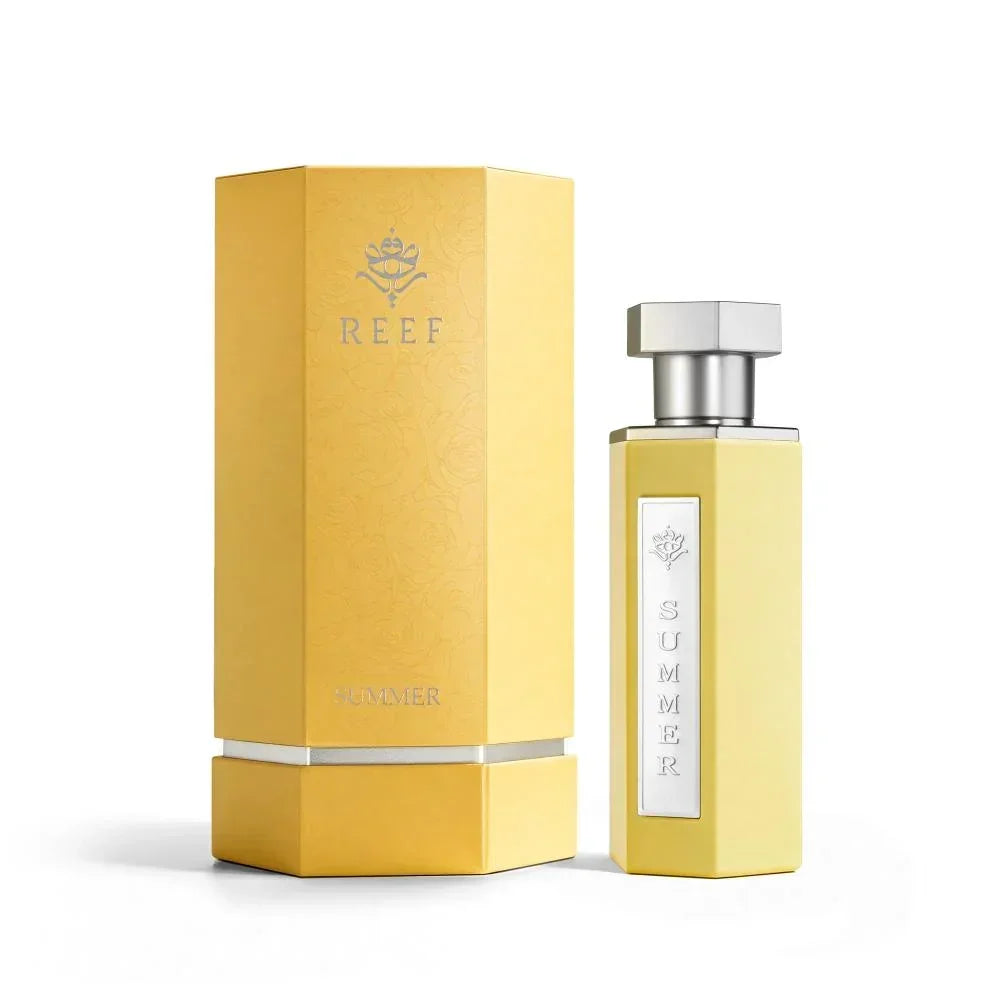 REEF Summer perfume bottle and box, golden yellow design with silver accents, luxury fragrance